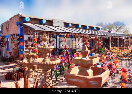 Colorful Mexican pots, stonewear and sculptures outside Cococh Boutique store in Tubac, Arizona Stock Photo