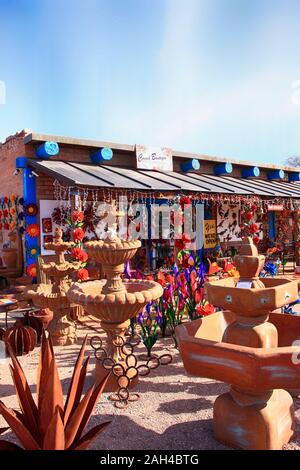 Colorful Mexican pots, stonewear and sculptures outside Cococh Boutique store in Tubac, Arizona Stock Photo