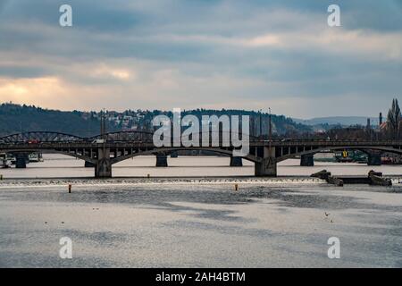 View of Prague from the bridge, Prague bridges on moldava with traffic Stock Photo