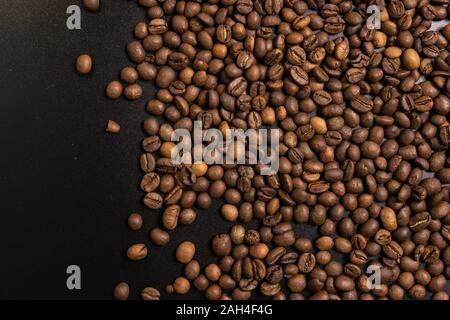dark roasted ready fresh coffee beans in bulk Stock Photo
