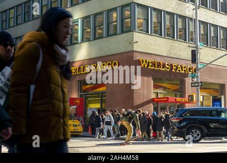 A Wells Fargo bank branch in busy Midtown Manhattan in New York on Friday, December 20, 2019. (© Richard B. Levine) Stock Photo