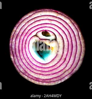 Red Onion Sliced on Black Background Stock Photo
