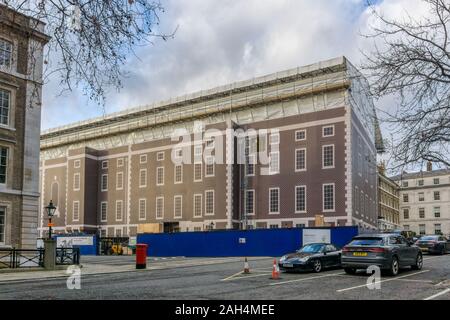 Painted hoarding around scaffolding as part of Project Pegasus - the redevelopment of the Inner Temple in the Inns of Court, London. Stock Photo