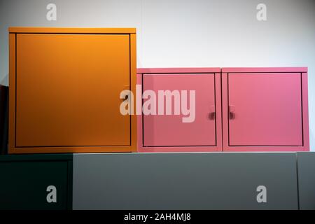 Storage Cabinet metal colorful helps you keep track of small items like chargers,keys and wallets,or more items. Stock Photo