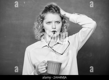 Fresh coffee. school teacher need coffee break. good morning. girl refreshing with tea drink. idea and inspiration. energy and vigor. energy charge. woman with coffee cup at blackboard. Stock Photo