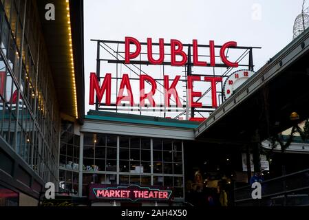 Seattle, WA / USA - circa November 2019: Crowd of people making their way around Pike Place market downtown, shopping for seafood, flowers, etc. Stock Photo