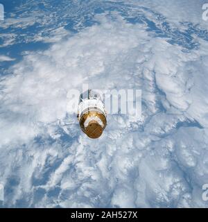 The Space Shuttle Atlantis backdropped over a colourful Earth Stock ...