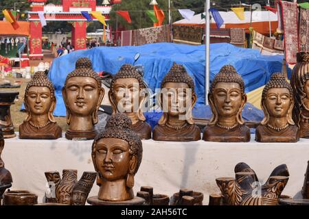 Lords Buddha's hand sculpted heads on display at a stall in Kalagram. Stock Photo