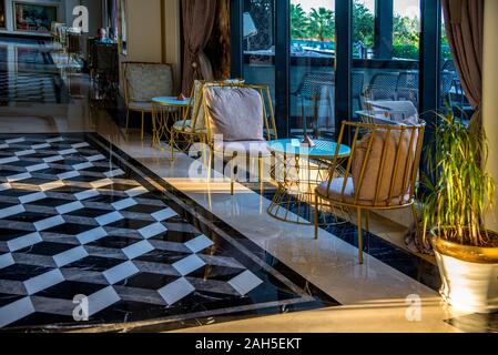 Empty chairs in the lobby early morning Stock Photo