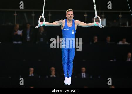 Szczecin, Poland, April 10, 2019: Marco Lodadio of Italy competes on the rings during the artistic gymnastics championships Stock Photo