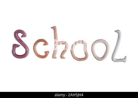 Inscription school made of plasticine isolated on a white background. Stock Photo