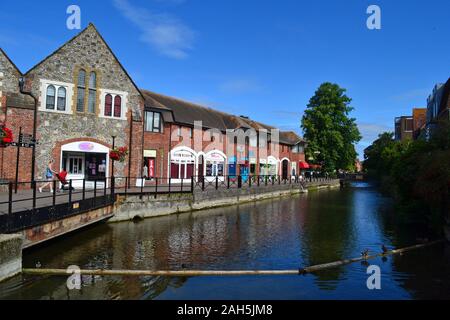 Shops beside the river in The Maltings, Salisbury, Wiltshire, UK Stock Photo