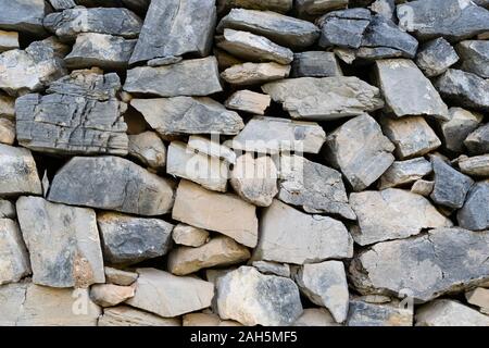 Dry grey stone wall background Stock Photo
