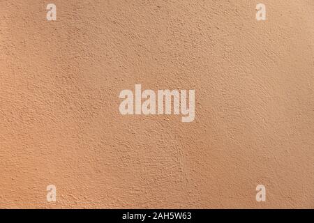 Pastel Orange Granite Wall Background, texture for designs Stock Photo