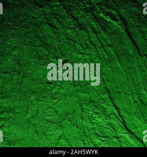 A natural background made of multi-colored wild stone close-up. View from above Stock Photo