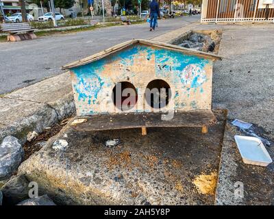 street house for homeless cats in Istanbul, Turkey. cat cabin stands on street for homeless cats. Concept of caring for street animals. Wooden Cat Stock Photo