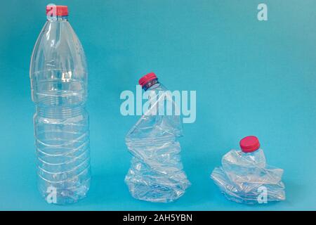 Plastic water bottles crushed and pressed for recycling, recycle concept, less volume Stock Photo