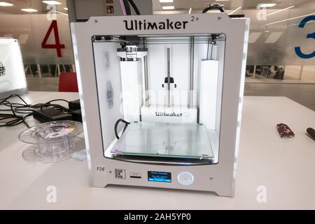 MADRID, SPAIN - December, 2019: Ultimaker 3D printer on the table at university. Modern professional 3D printer in the office Stock Photo