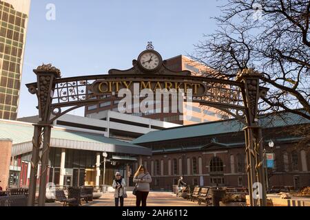 The sign and clock outside City Market on East Market Street in downtown Indianapolis, Indiana, USA Stock Photo