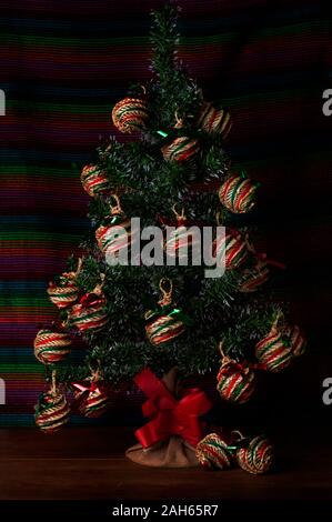 Christmas tree Christmas still life with handmade spheres on wooden background Stock Photo