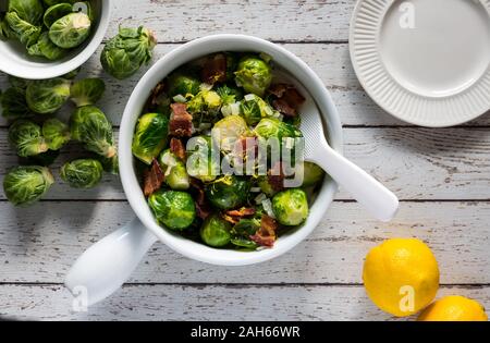 Cooked brussel sprouts and bacon. Stock Photo
