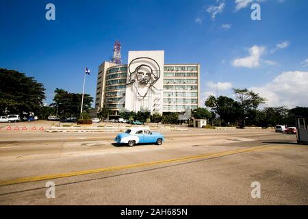 Camilo Cienfuegos likeness on the facade of the the ministry of information, revolution square, Havana, Cuba Stock Photo
