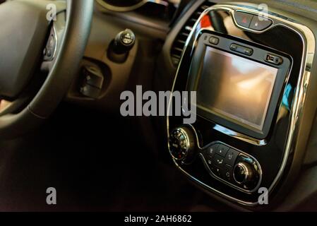 Close up black multimedia panel in modern car Stock Photo