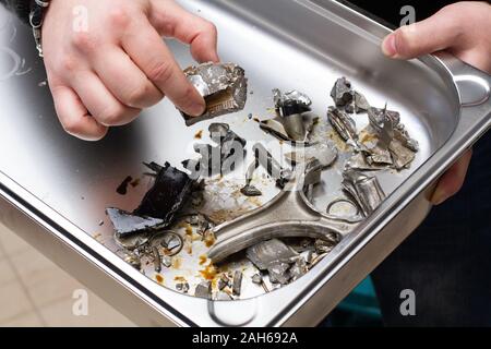 the engine of the sports car exploded and collapsed at the start of the race Stock Photo