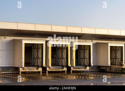 Logistic warehouse truck loading gates. Distribution warehouse building doors Stock Photo