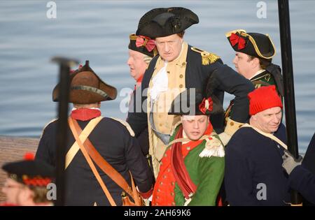 Washington Crossing, Pennsylvania, USA. 25th Dec, 2019. George Washington, portrayed by John Godzieba gives orders to his men as they ready their boats during the official Christmas Day Crossing of the Delaware reenactment by George Washington and his troops  Wednesday, December 25, 2019 at Washington Crossing State Park in Washington Crossing, Pennsylvania. (WILLIAM THOMAS CAIN / PHOTOJOURNALIST) Credit: William Thomas Cain/Alamy Live News Stock Photo