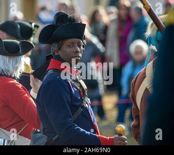 Washington Crossing, Pennsylvania, USA. 25th Dec, 2019. Soldiers march as they ready to go to their boats during the official Christmas Day Crossing of the Delaware reenactment by George Washington and his troops  Wednesday, December 25, 2019 at Washington Crossing State Park in Washington Crossing, Pennsylvania. (WILLIAM THOMAS CAIN / PHOTOJOURNALIST) Credit: William Thomas Cain/Alamy Live News Stock Photo