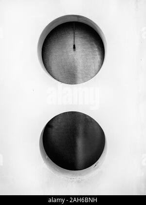 Two circular windows in black and white Stock Photo