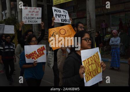 Kolkata, India. 24th Dec, 2019. Today the students of the PRESIDENCY UNIVERSITY of Kolkata organised a rally includes students, professors and faculty members to protest of National Register of Citizens (NRC) and a new Citizenship Amendment Act (CAA), the day after a grand rally in support of CAA, NRC and NPR organised by the BJP. Kolkata, West Bengal, India. 24th December 2019. (Photo by Sukhomoy Sen/Pacific Press) Credit: Pacific Press Agency/Alamy Live News Stock Photo