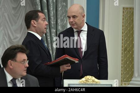 Moscow, Russia. 25 December, 2019. Russian Prime Minister Dmitry Medvedev, left, and First Deputy Prime Minister and Finance Minister Anton Siluanov before the year end meeting of the Council for Strategic Development and National Projects hosted by President Vladimir Putin at the Kremlin December 25, 2019 in Moscow, Russia.  Credit: Aleksey Nikolskyi/Kremlin Pool/Alamy Live News Stock Photo