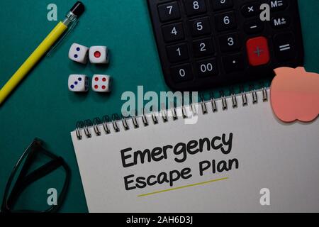 Emergency Escape Plan write on a book isolated on Office Desk Stock Photo