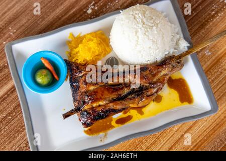 popular filipino food chicken barbeque with rice at Dumaguete ...