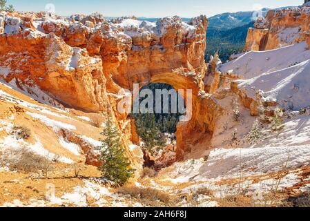 Natural Stone Bridge, Arch at Bryce Canyon with snow