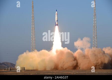 (191226) -- BEIJING, Dec. 26, 2019 (Xinhua) -- The commercial suborbital carrier rocket Tansuo-1 blasts off from the Jiuquan Satellite Launch Center in Jiuquan, northwest China's Gansu Province, Dec. 25, 2019. The commercial suborbital carrier rocket Tansuo-1 developed by a private Chinese company was launched from the Jiuquan Satellite Launch Center in northwest China Wednesday. The rocket can serve purposes of meteorological observation, microgravity testing as well as satellite payload experiments. It was the maid flight of the first rocket developed by the company. (Photo by Wang Jiangbo/X Stock Photo