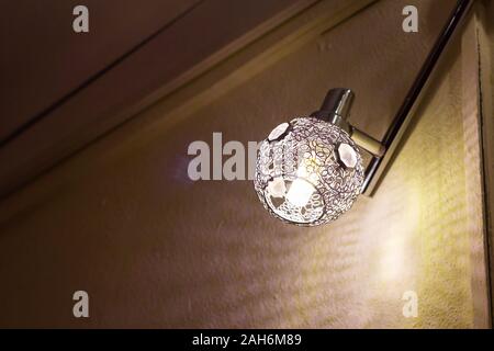 lamp metal shade. ornate pattern in the interior Stock Photo