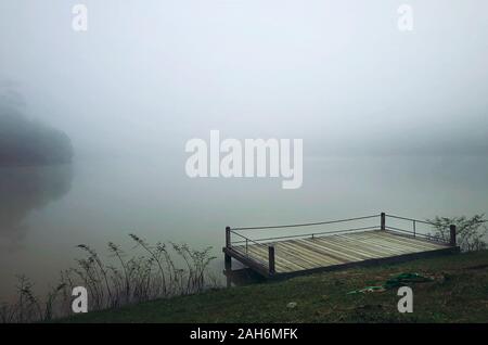 Misty lake in early morning Stock Photo