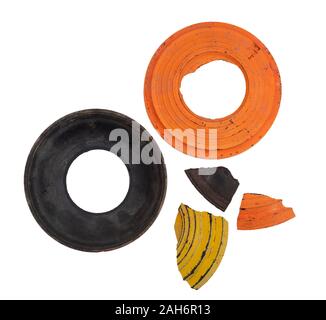 Clay pigeon shooting - target skeet with bullseye hole, shards, isolated on white background. Stock Photo