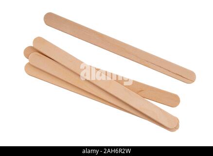 Wooden lollipop, popsicle or craft sticks, isolated on white background. Stock Photo