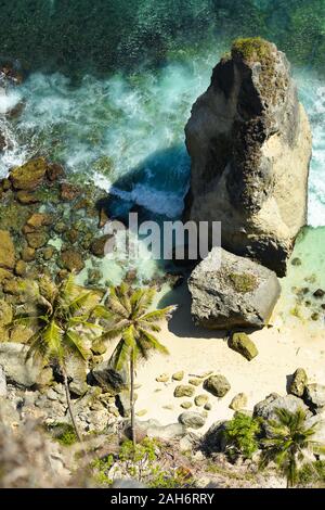 View from above, stunning aerial view of the beautiful Diamond Beach bathed by a turquoise sea. Stock Photo