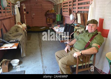 1940s ambulance on the Severn Valley Railway, during a 1940s weekend, Shropshire, UK Stock Photo