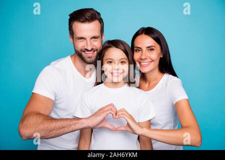 Photo of adopted family taking care of little daughter show heart figure, wear casual outfit isolated blue background Stock Photo