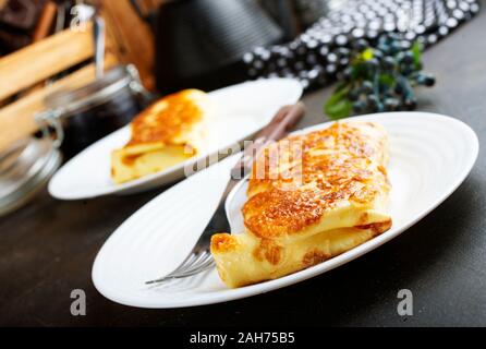pancakes stuffed with cottage and cherry jam Stock Photo