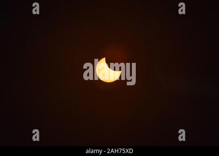 Kuala Lumpur, Kuala Lumpur, MALAYSIA. 26th Dec, 2019. The sun viewed through a solar filter during the partial solar eclipse phenomenon in Kuala Lumpur. Credit: Fuad Nizam/ZUMA Wire/Ģ����ý Live News Stock Photo