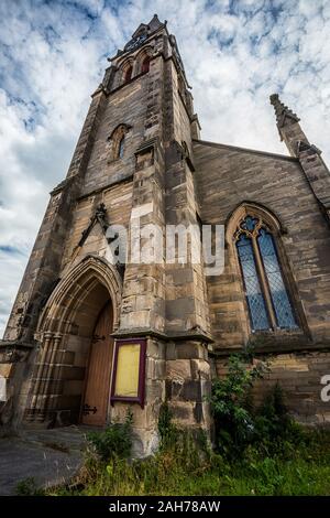 Low angle shot of an ancient church facade detail under a beautiful ...