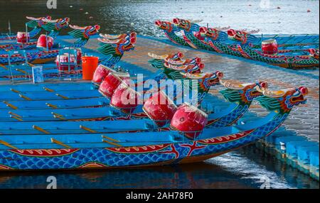 A row of Dragonboats in a river in Taipei during the 2019 Taipei Dragon Boat festival in Taipei Taiwan Stock Photo