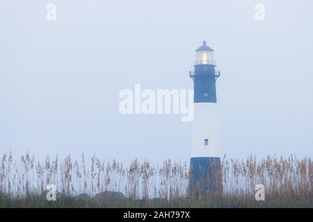 Lighthouse at foggy morning, Tybee island, USA Stock Photo